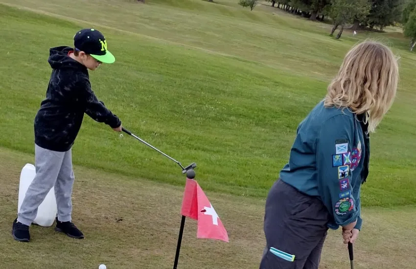 Scouts playing golf
