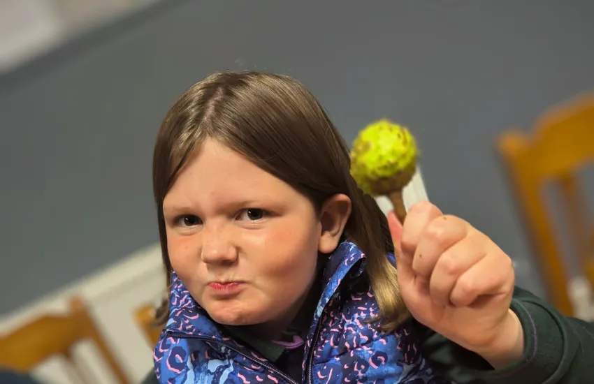 a cub with her conker