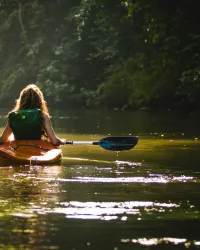 a female in a kayak