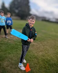 a cub playing rounders