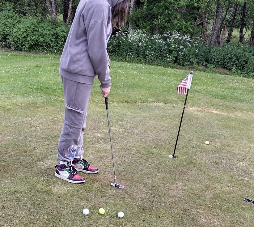 Scouts playing golf