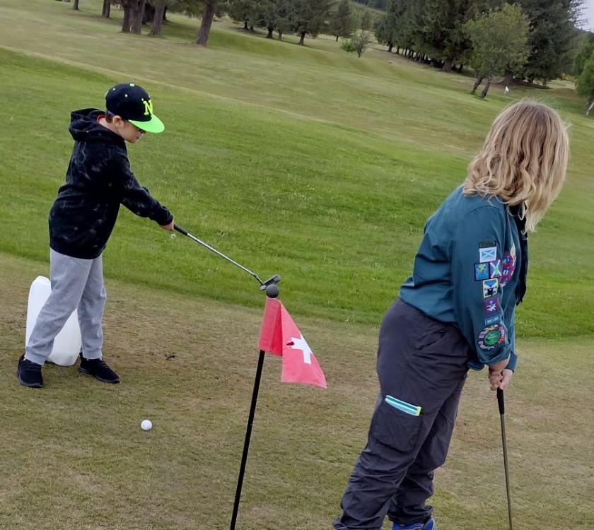 Scouts playing golf