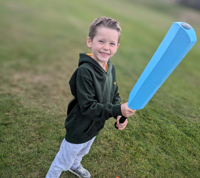 a cub playing rounders