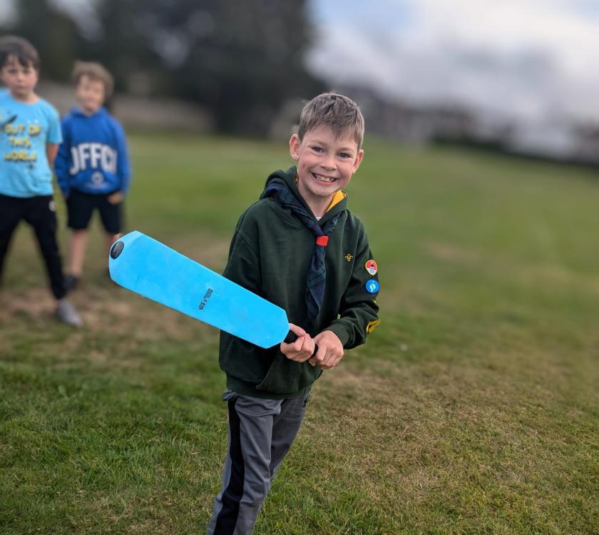 a cub playing rounders