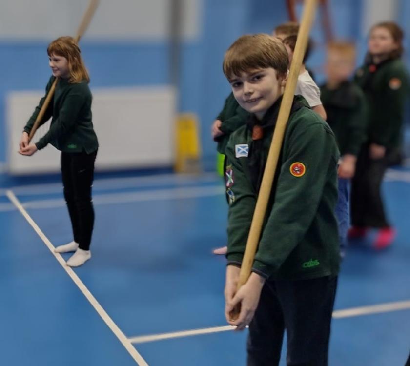 Cubs tossing the caber