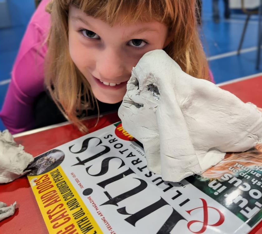 A Cub making Halloween sculptures
